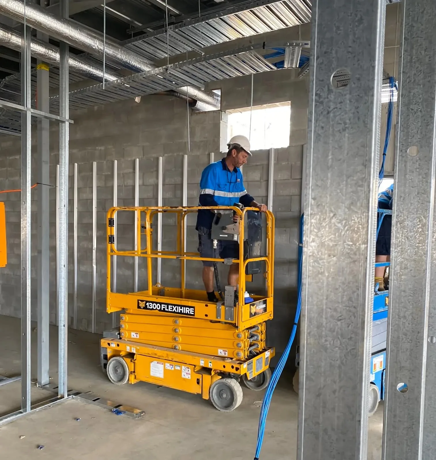 Pete Morgan on site — ICT fit-out delivery, structured cabling and tray work at altitude